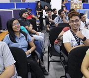 picture of employees smiling in office